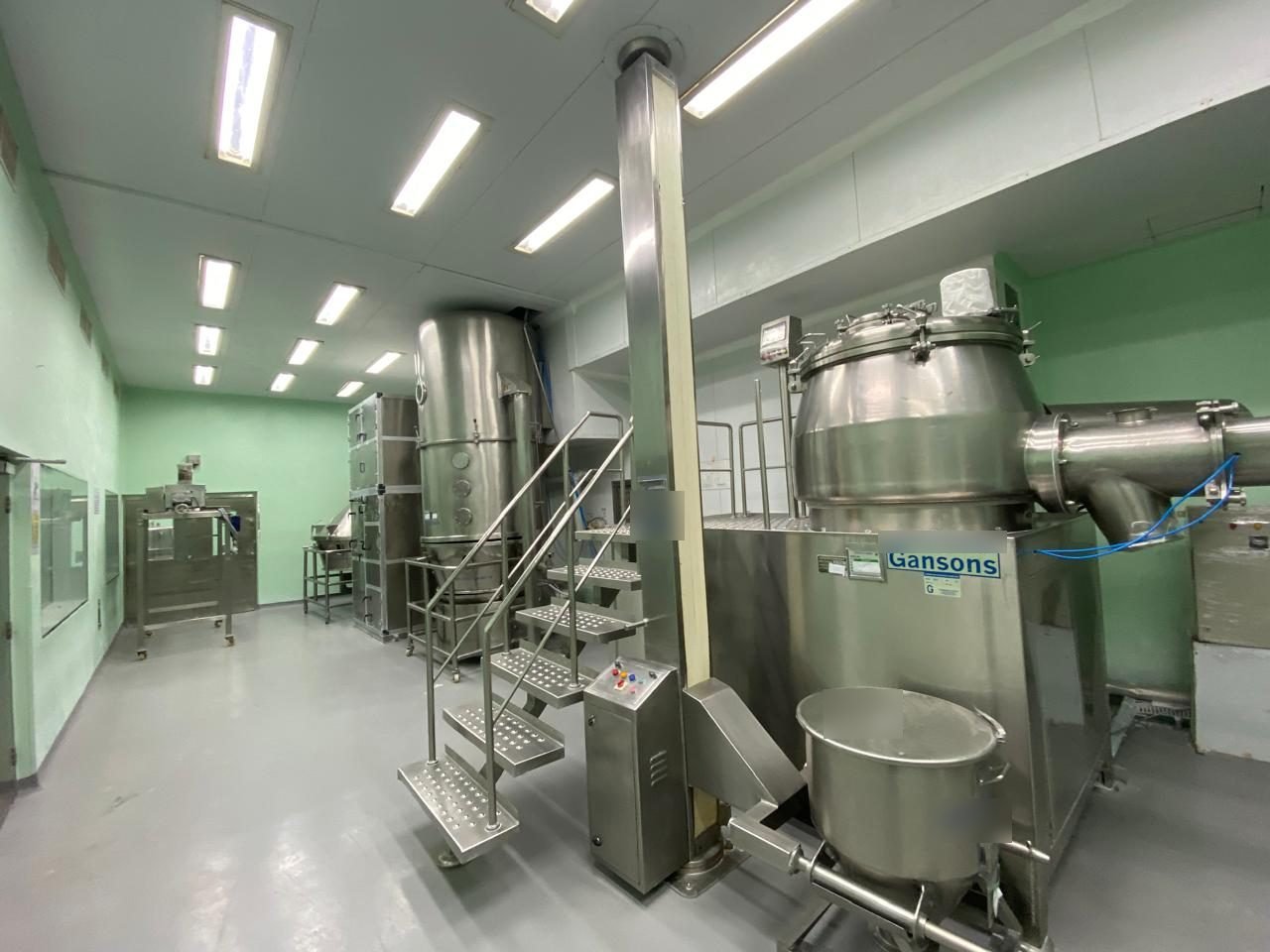Pharma plant for sale in Kolhapur: tablet granulation area with rapid mixer granulator and fluid bed dryer