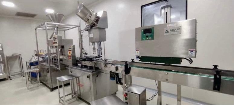 Beta-lactam dry syrup powder filling, capping and induction sealing line at the Kangra pharma plant