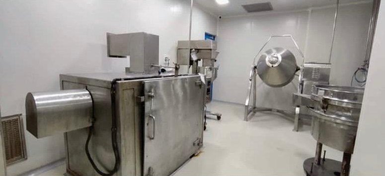 Beta-lactam dry syrup granulation room with tray dryer and double cone blender at the Kangra pharma plant