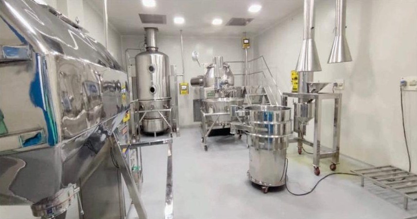 Second tablet granulation room at the Kangra pharma plant with blender, fluid bed dryer and vibro sifter